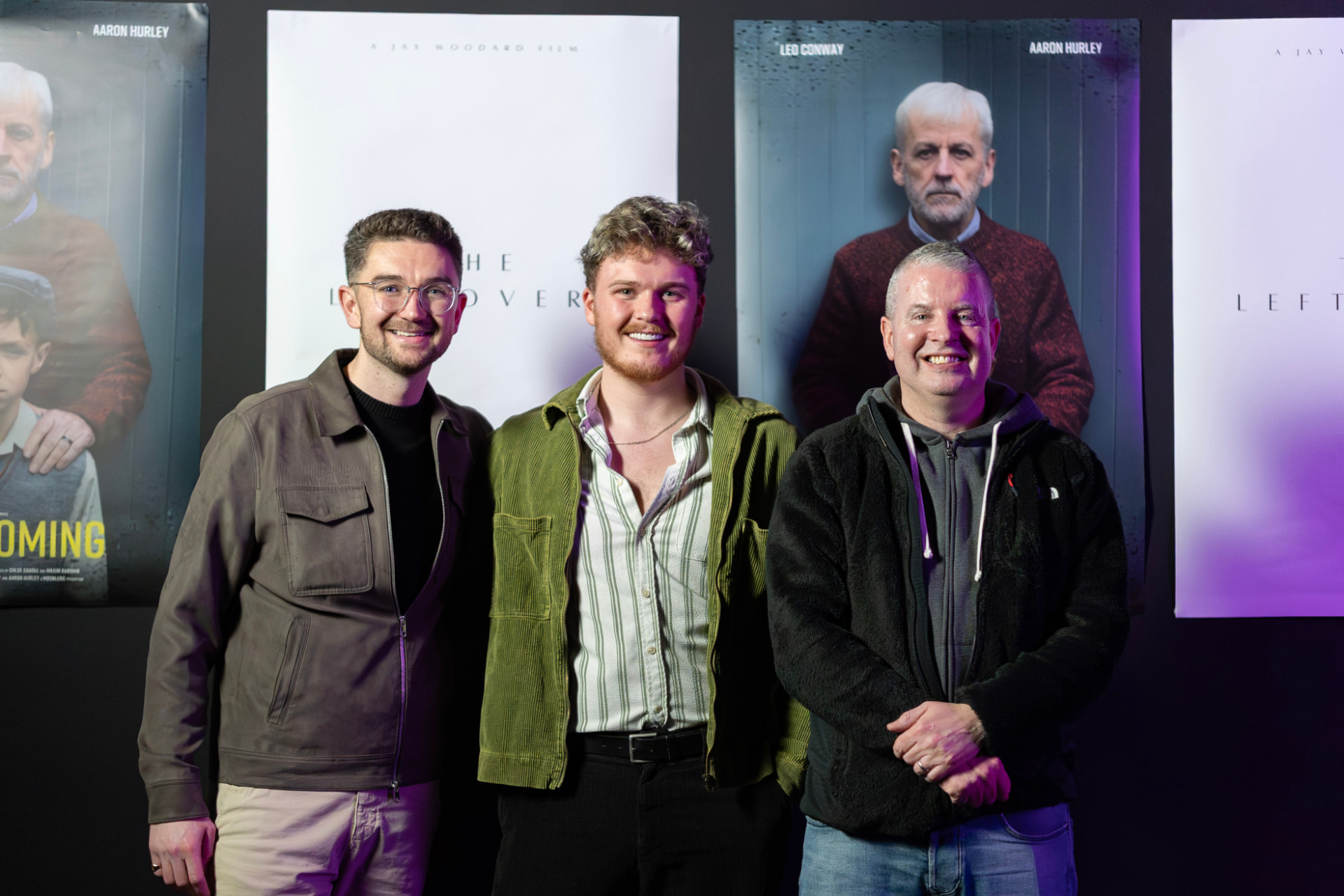 Filmmakers in front of The Leftovers posters at the premiere